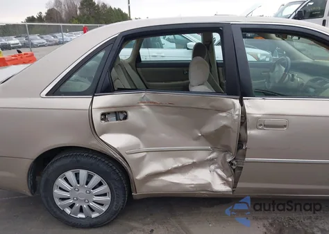 2000 Toyota Avalon Xl z USA, uszkodzony, nr VIN 4T1BF28B2YU046034